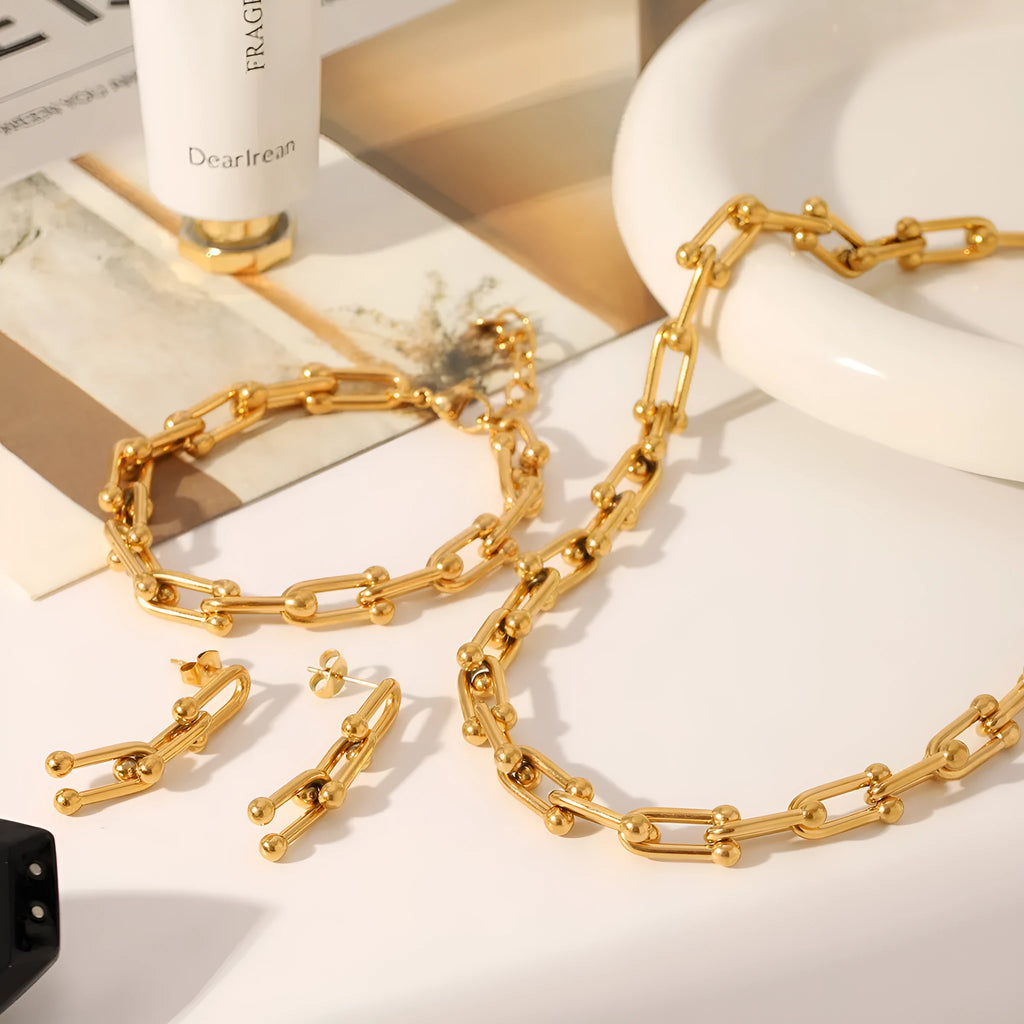 Stainless steel horseshoe jewellery set with necklace, bracelet, and matching earrings