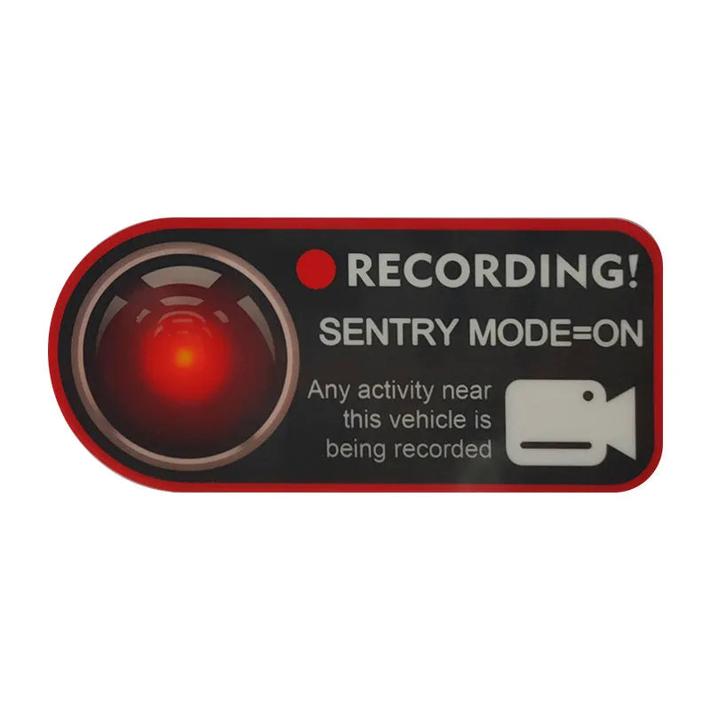 Tesla Sentry Mode electrostatic warning sticker measuring 11 by 5 centimetres