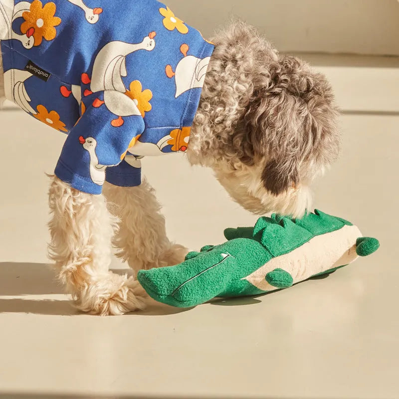 Green plush toy dog with dimensions 35cm by 18cm, weighing 90g, for interactive play.