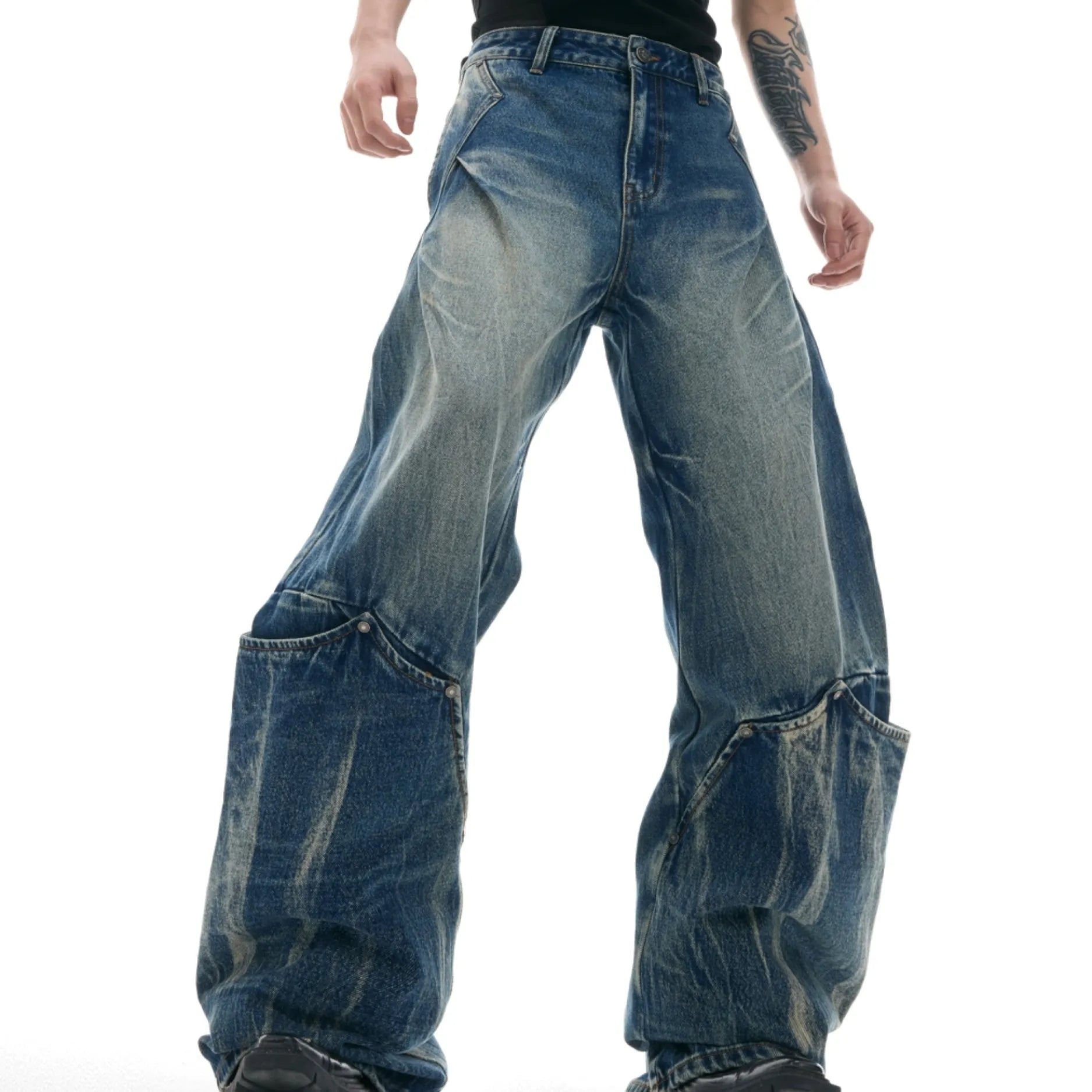 Men's verdant blue jeans with washed burst pattern and curved knife detailing, loose fit design