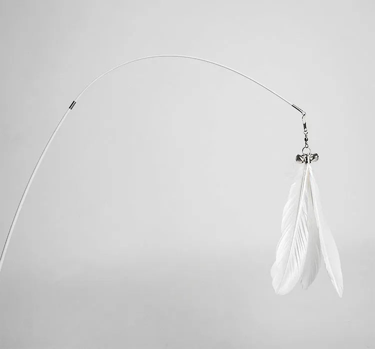 Telescopic cat fishing rod extended, showing goose feather bell toy and removable pen on fibre shaft
