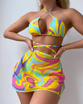 Yellow striped halter-neck swimsuit with lace-up front, matching skirt, and shorts