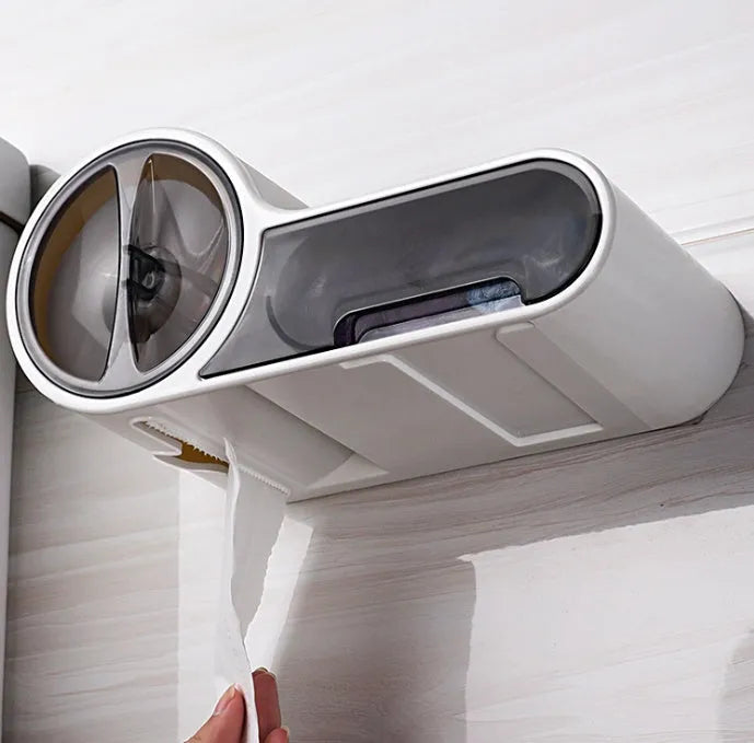 White plastic free-standing toilet roll holder with a curved design on a bathroom surface.