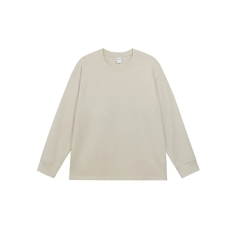 Men's simple solid colour long sleeve cotton t-shirt shown in loose fit on a hanger.