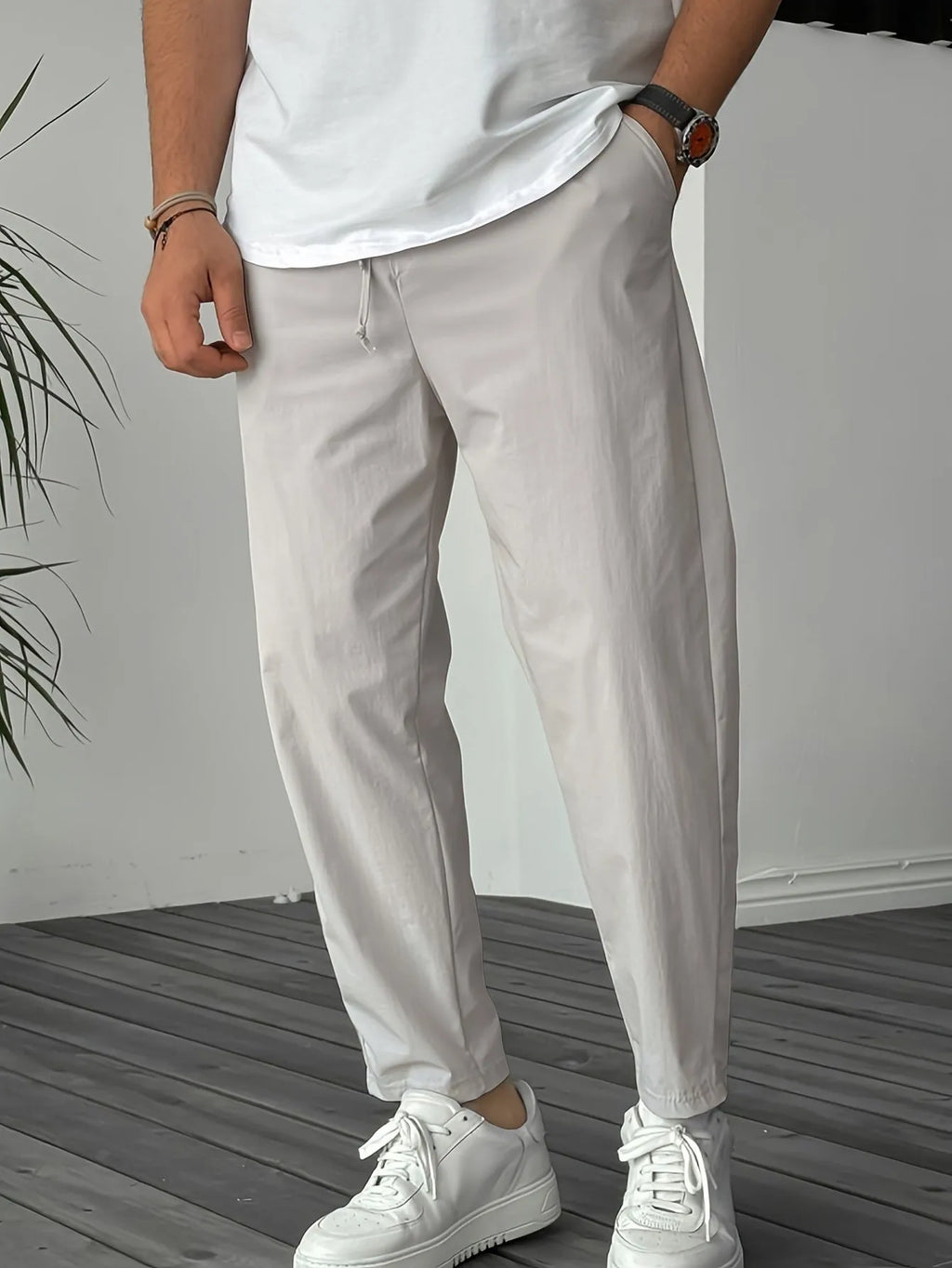 Men's straight-leg casual trousers with drawstring waistband and ribbon pocket detailing