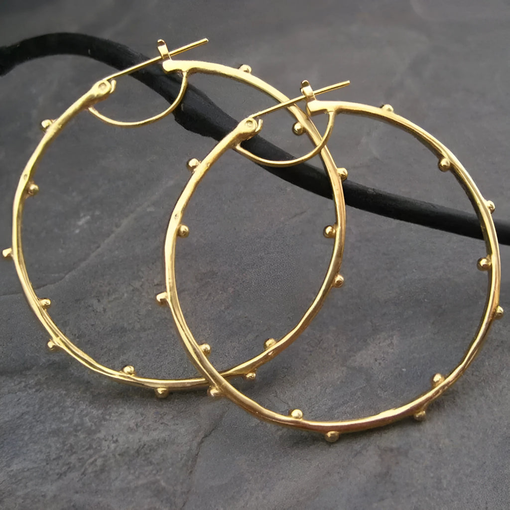 Gold plated alloy ear clip earrings with large ear shape, copper ring and petal geometry for women