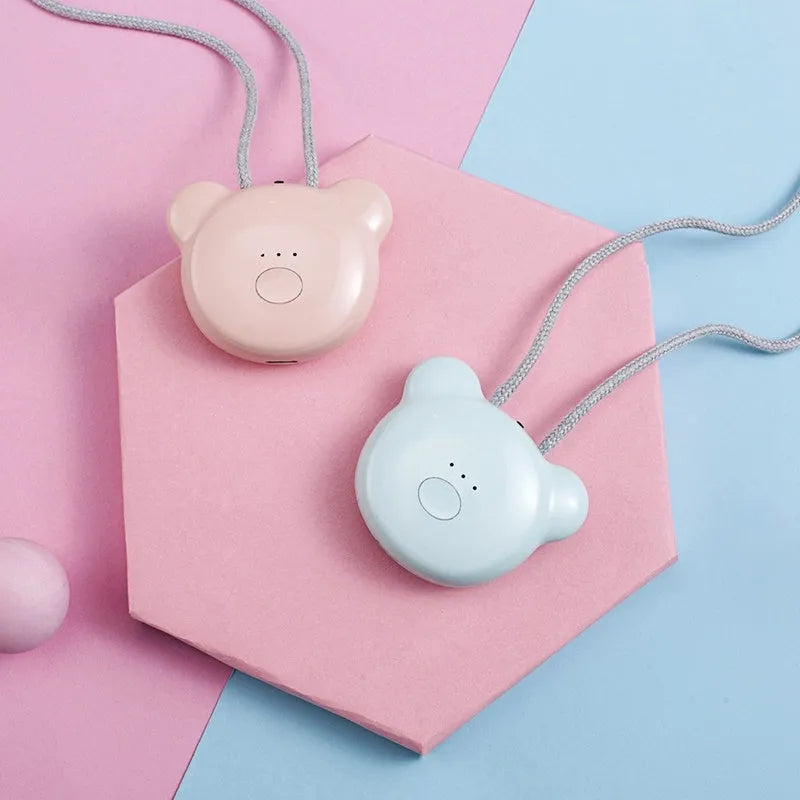 USB mini portable air purifier necklace in blue, showing compact design with USB charging port