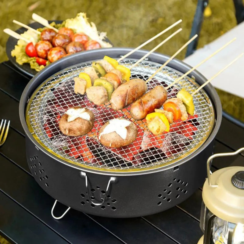 Portable stainless steel BBQ grill with detachable parts and storage bag for outdoor cooking