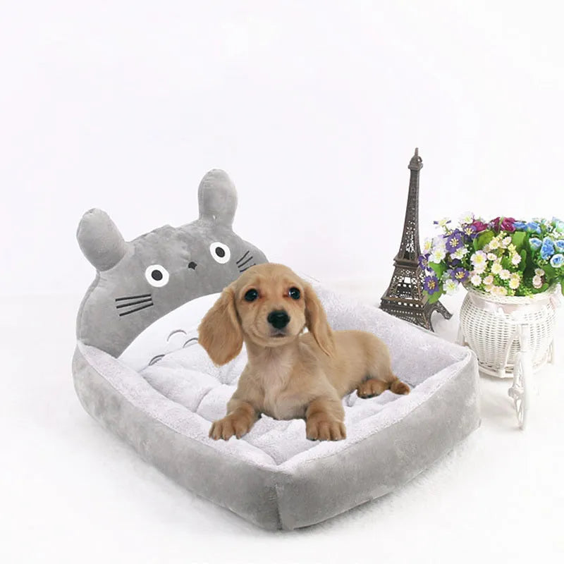 Washable cartoon pet bed with raised edge for small dogs and cats in navy blue colour