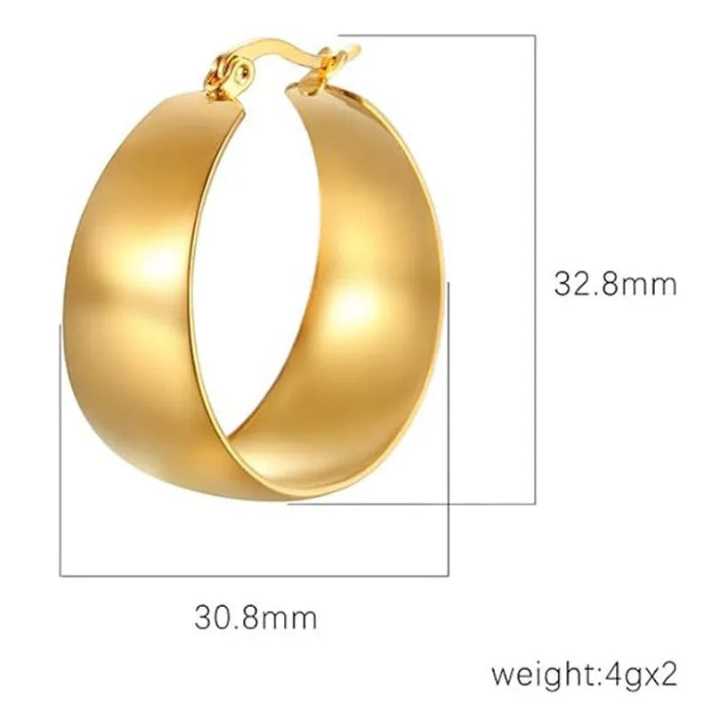 Widened curved stainless steel earrings in gold or steel colour, available in 25mm or 30mm sizes