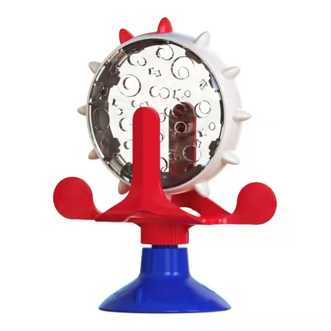 Interactive pet puzzle toy with rotating food dispenser and sucker base in blue, green, red, or yellow