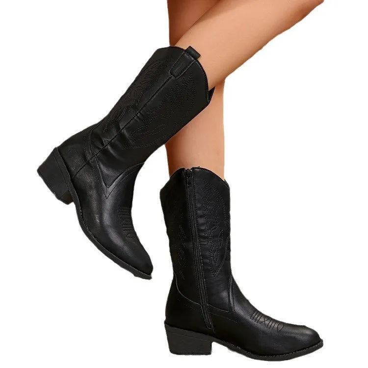 Women's black mid-calf martin boots with chunky heel and pointed toe on white background