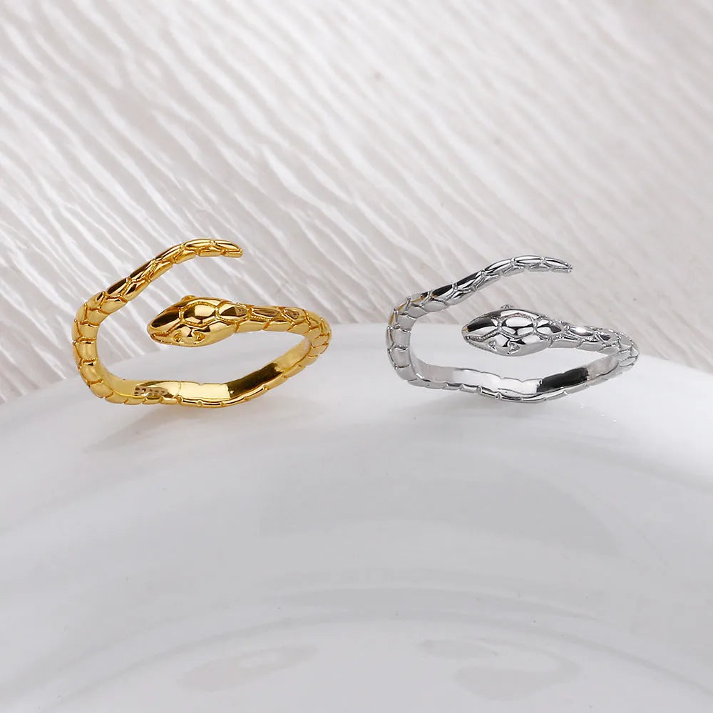 Open snake ring with textured copper band, electroplated in platinum or gold colour
