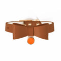 Brown leather cat collar with a silver buckle on an adjustable strap.
