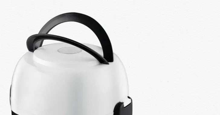White rice cooker with 2 litre capacity and steaming basket options