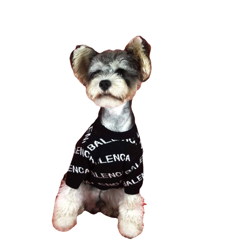 Acrylic pullover dog sweater in black or green, sizes S to 2XL, shown for schnauzer and small dog use.