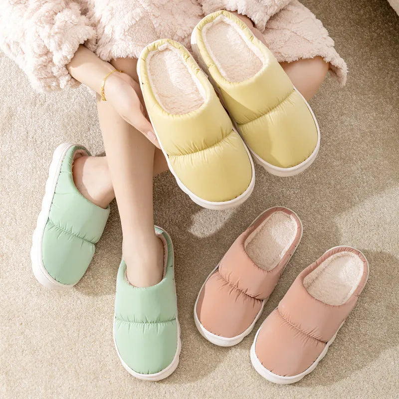 Down cotton slippers with artificial leather upper, rubber anti-slip soles, and plush lining in blue, green, grey, pink, or yellow