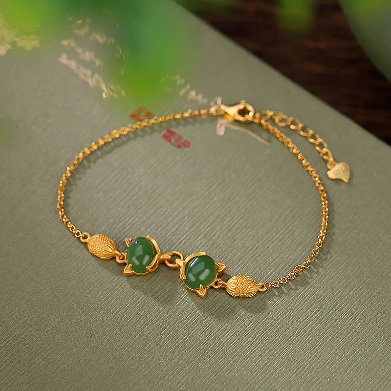 925 silver women's bracelet with fox charm and genuine Hetian jade stone on adjustable chain.