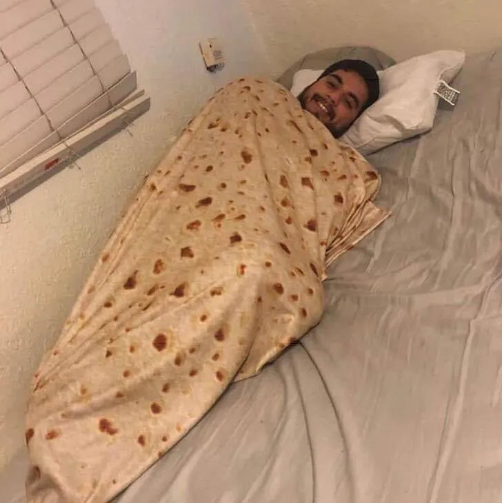 Flannel burrito blanket with food-themed print, showing soft microfiber fleece texture and round or rectangular shape options