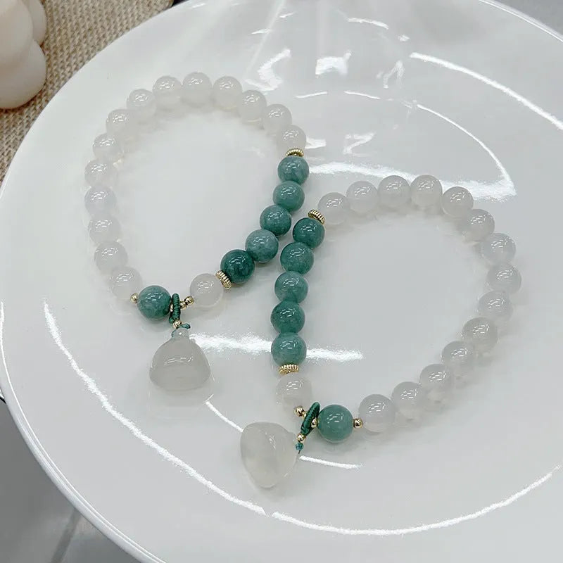 Women's retro Chinese style agate bracelet with lotus seedpod design and handmade craftsmanship