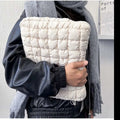 Black and white cloud cotton laptop storage bag showing nylon material and size options for 11 to 15.6 inch devices