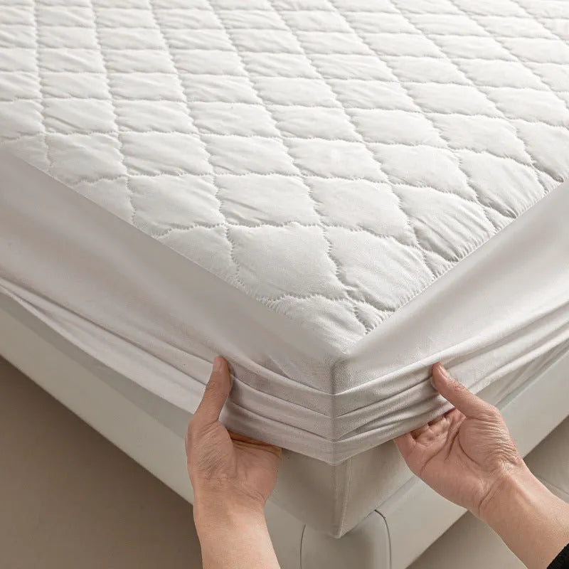 Diamond lattice quilted waterproof mattress protector set in black, grey, pink, or white with bamboo fibre material and fitted sheet sizes.