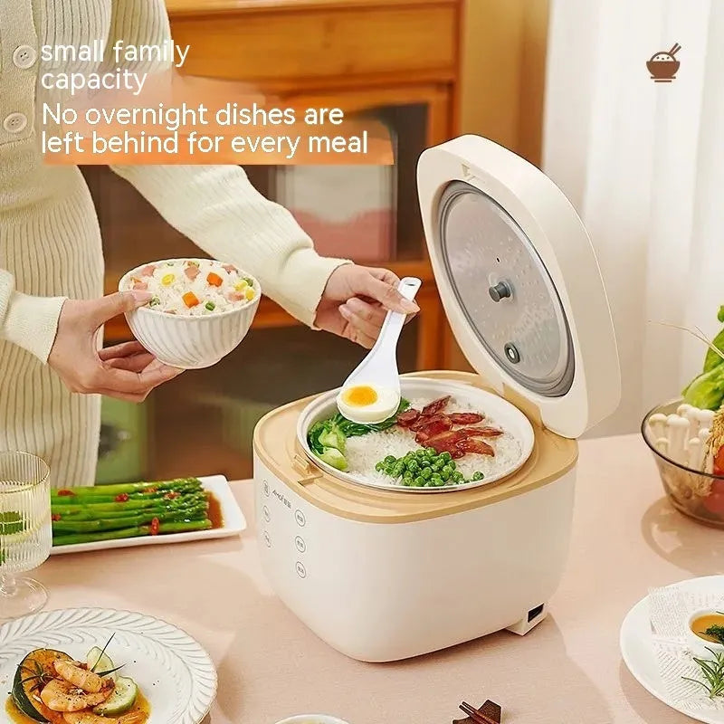 White and beige plastic multi-function 3-litre rice cooker with black inner pot and accessories.