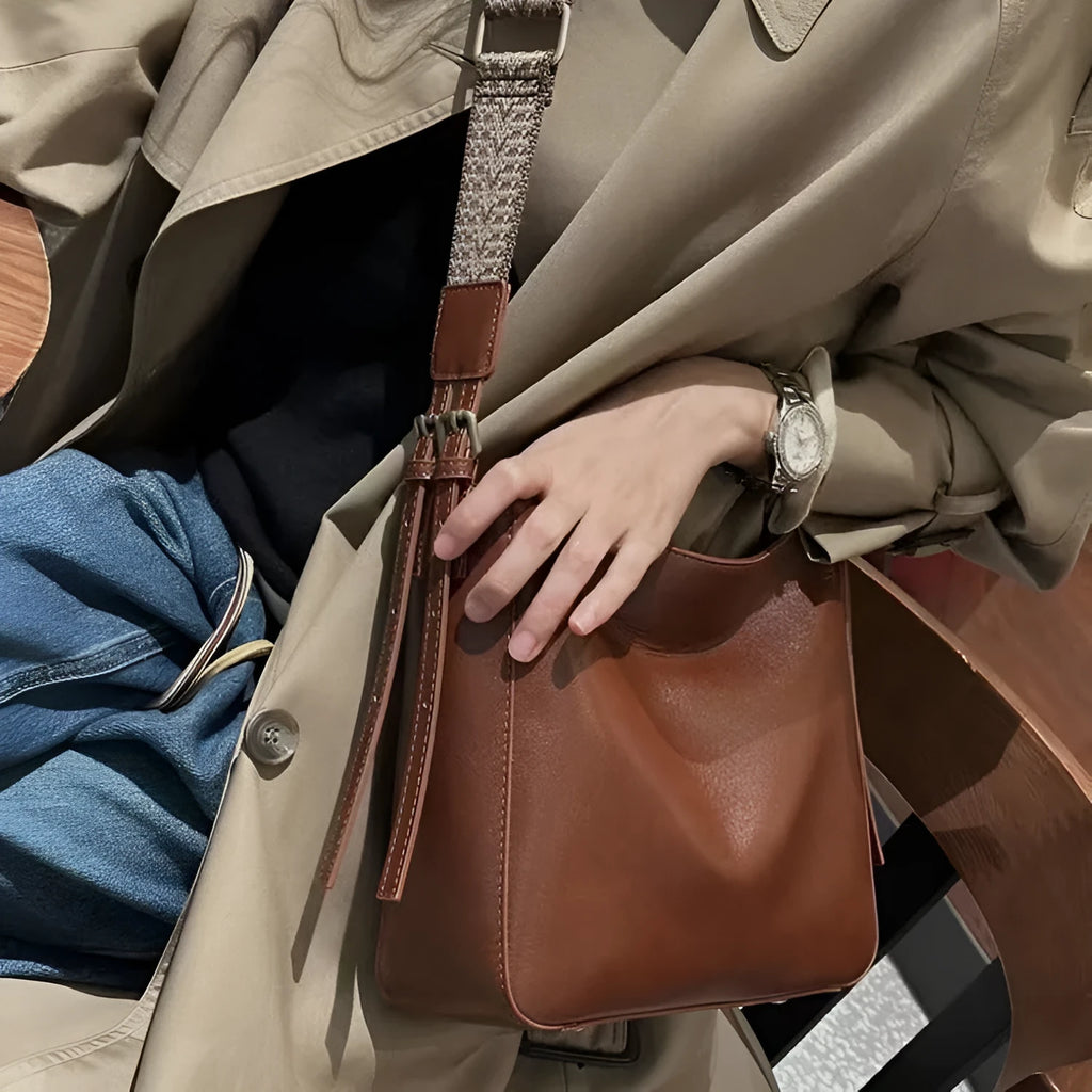 Women's large-capacity leather shoulder messenger bag in square vertical shape with multiple interior compartments
