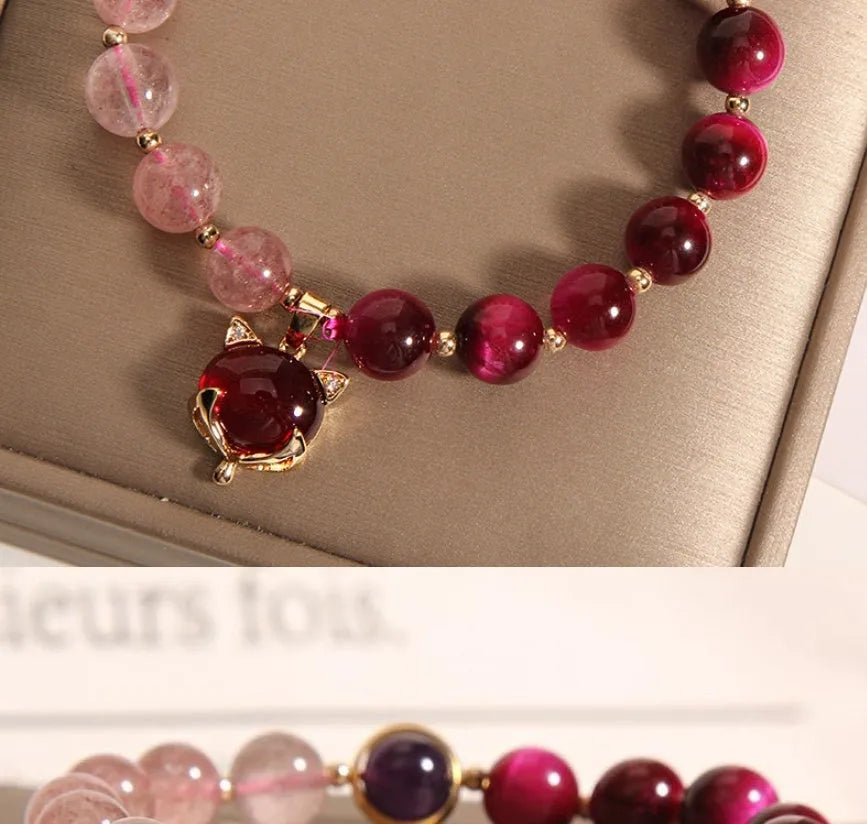 Strawberry crystal bracelet on elastic rope measuring 18cm length