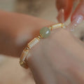 Natural Hetian Jade white lip shell bracelet with round beads and simple geometric design