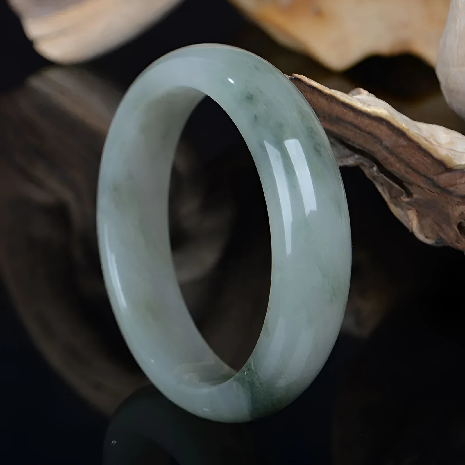 Natural Jinsi Jade Chinese-style bracelet shown in various sizes from 52mm to 62mm inner diameter.