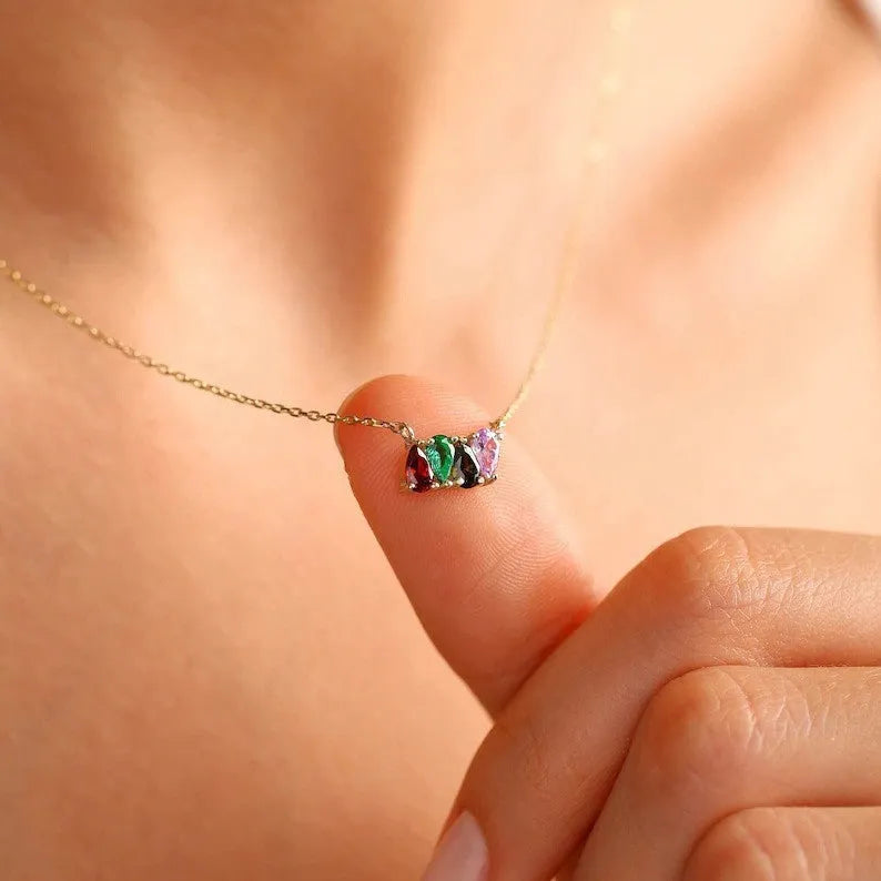 Zircon stone set on a titanium steel clavicle chain necklace in an electroplated silver finish.