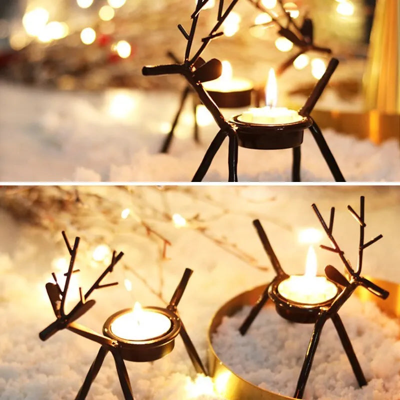 Black iron Christmas deer candlestick holder with Santa and snowman designs, 15cm height