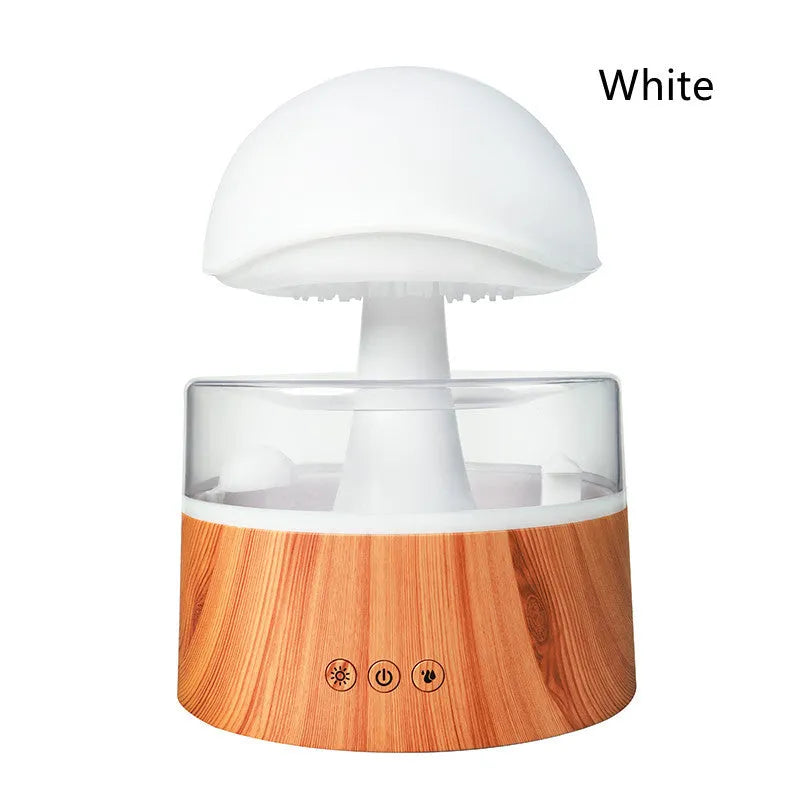 White rain cloud shaped humidifier with rainfall simulation and colour changing night light functions