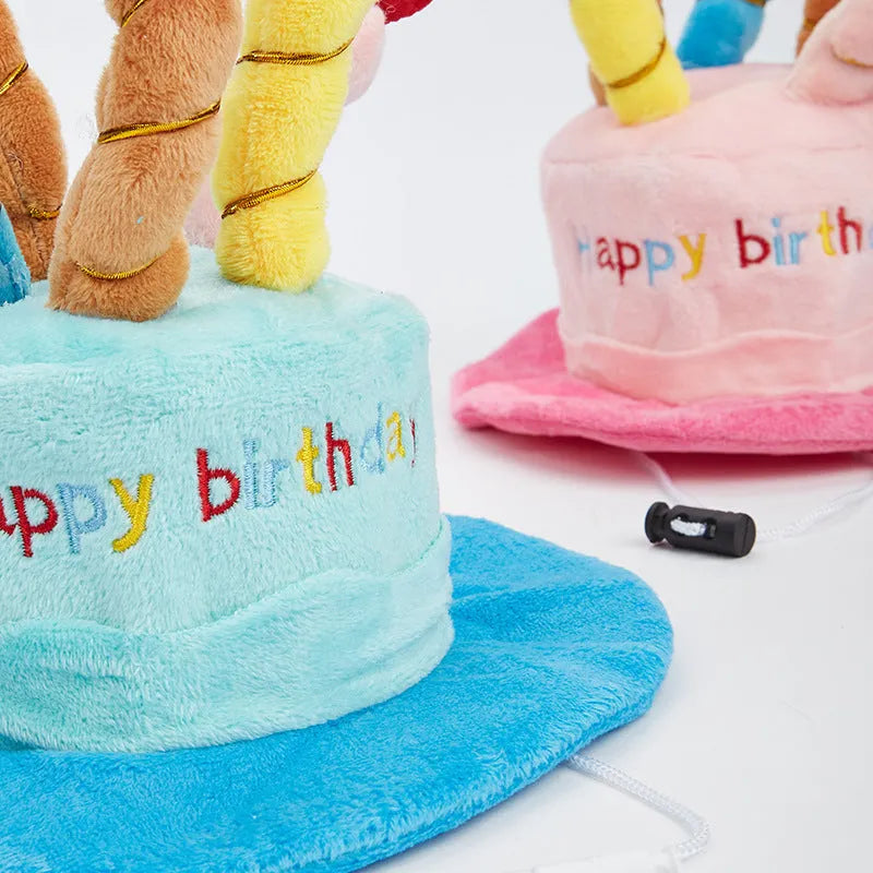 Blue and pink dog birthday hat toy showing 21x15x6.5cm dimensions for pet celebrations