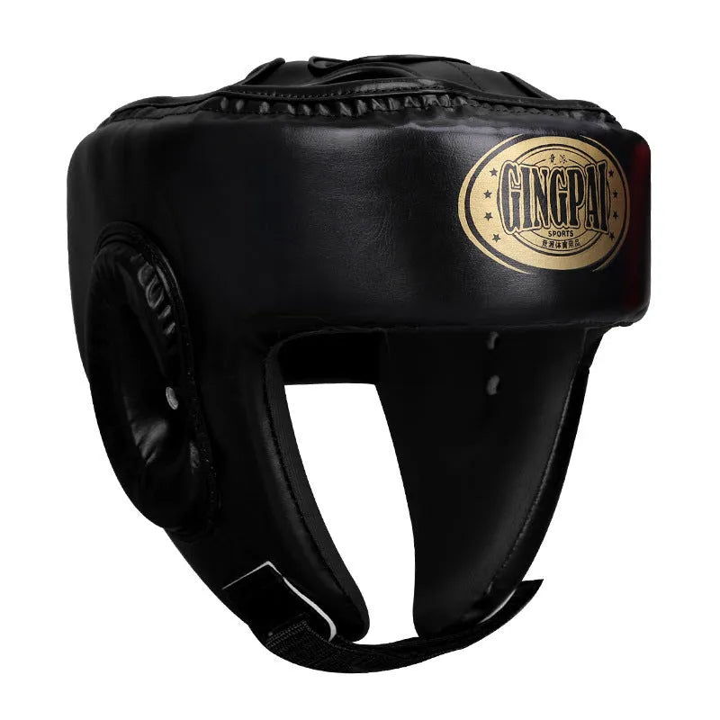 Red fully enclosed boxing helmet with jaw protection showing vertical ventilation design
