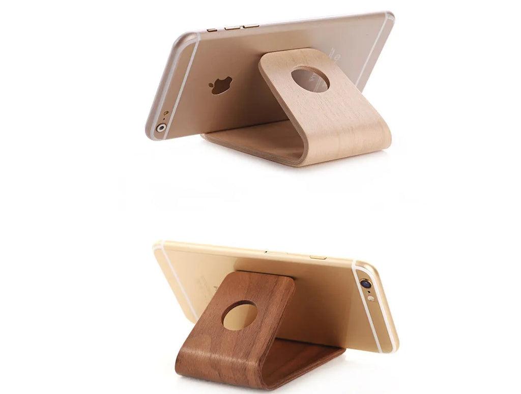Walnut and white maple wooden stands holding iPhones at viewing angles