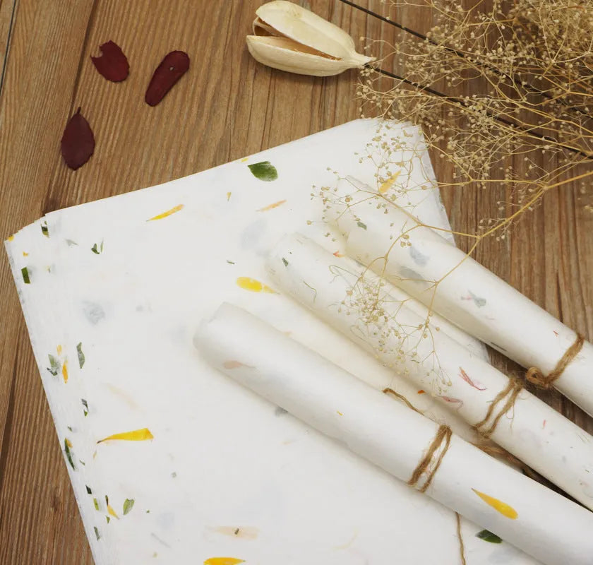Ten sheets of Chinese ancient-style painting paper in green, red, and yellow designs, measuring 27.5 by 16.7 cm