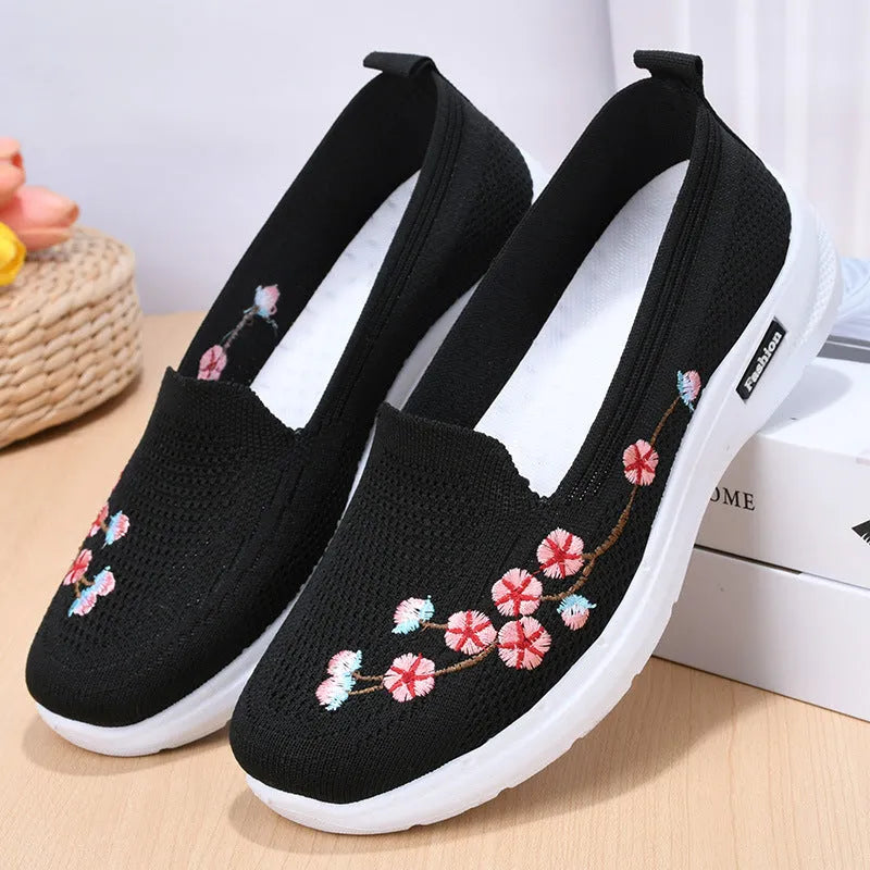 Women's low-heel woven casual pumps with flower embroidery and an anti-slip sole in wine red.