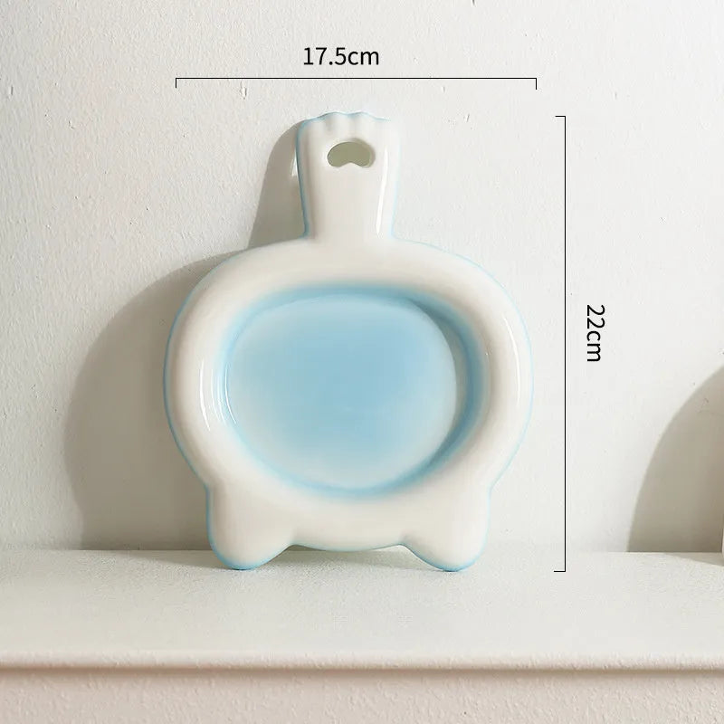 Ceramic cat bowl with shallow design in blue colour showing heavy stable base