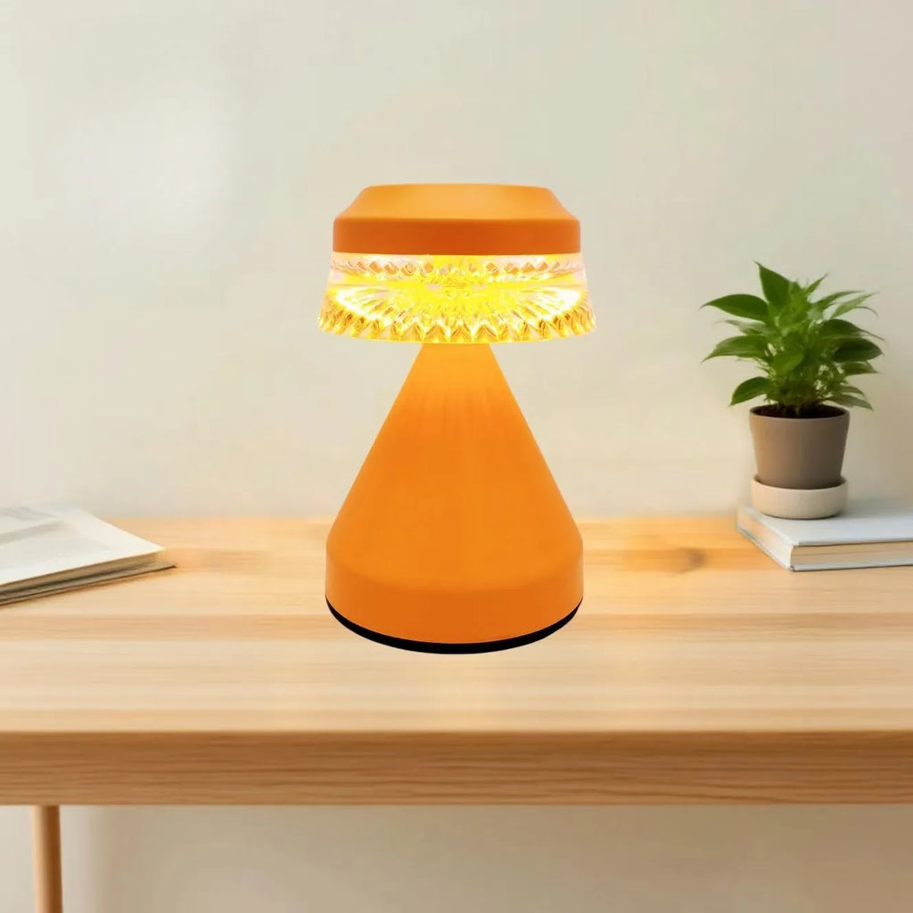 Creative LED charging night lamp with touch dimming controls in black finish on bedside table