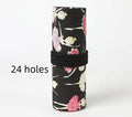 Canvas rolling pencil case with ballet girl print, shown open to reveal multiple pencil slots.