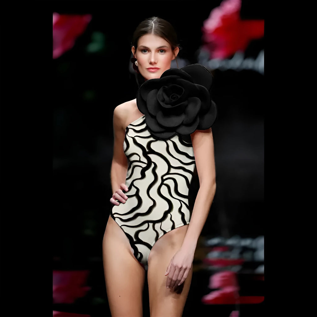 Nylon one-piece swimsuit in a floral or solid colour pattern with a European and American fit