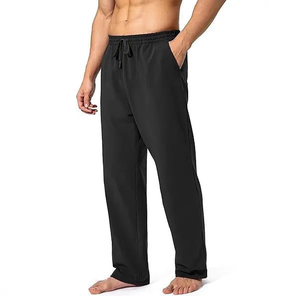 Men's loose-fitting grey casual trousers made from quick-drying polyester fabric.