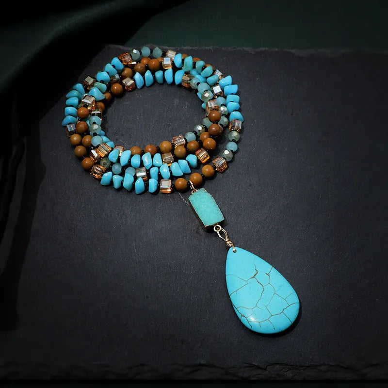 Blue turquoise heart-shaped pendant necklace with water drop silhouette on 81cm ball bead chain