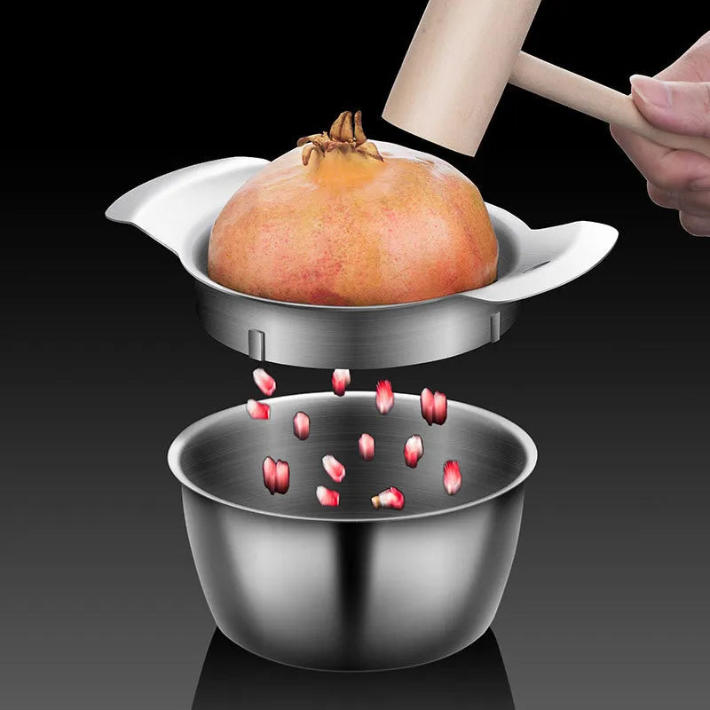 Stainless steel pomegranate fruit opener tool with wooden hammer and bowl for deseeding.