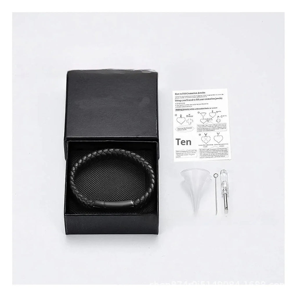 Black woven stainless steel and leather cinerary casket bracelet with engraved text.