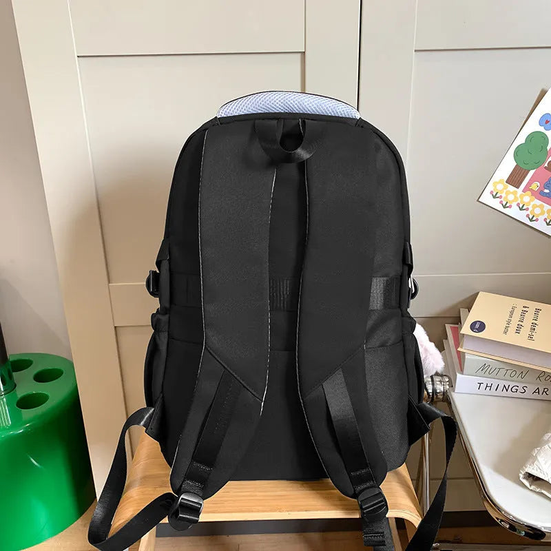 Waterproof nylon school backpack with curved shoulder straps in various colours with pendant options
