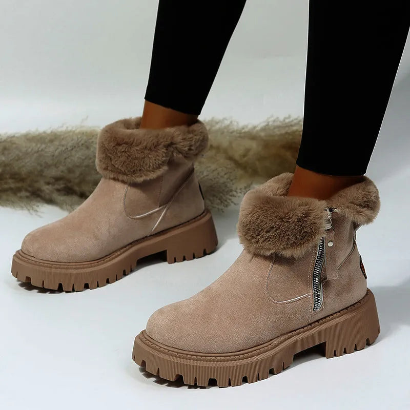 Women's black snow boots with high-top design, side zipper, and non-slip rubber sole for winter
