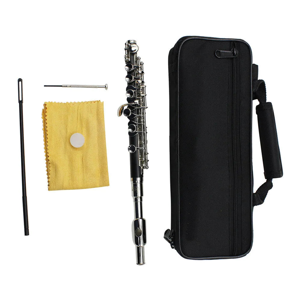 C key piccolo with bakelite tube body and silver plated finish, 31cm, shown with cloth box and cleaning accessories